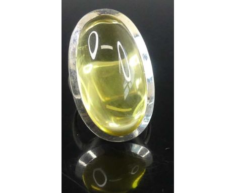A contemporary silver and cabochon yellow glass set dress ring, 16.9g, sponsor YC, size N 