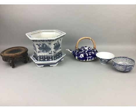 CHINESE BLUE AND WHITE PLANTER AND STAND,along with a teapot, two bowls and two stands