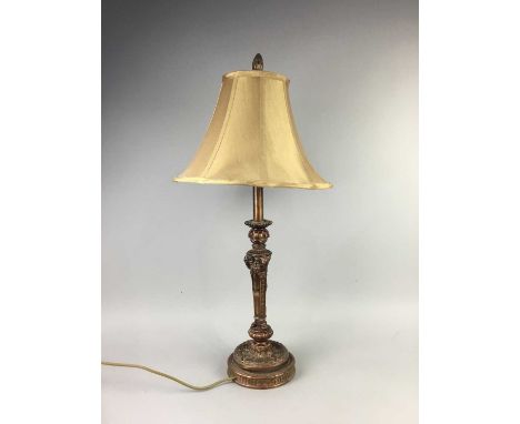 NEO CLASSICAL STYLE ‘CANDLESTICK’ TABLE LAMP, the tapered column with rams head ornament, on a circular base and with a shade