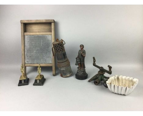 PAIR OF BRONZED SPELTER FIGURES OF A FISHERMAN AND FISH SELLER,along with a fishing reel, an Arts &amp; Crafts brass planter,