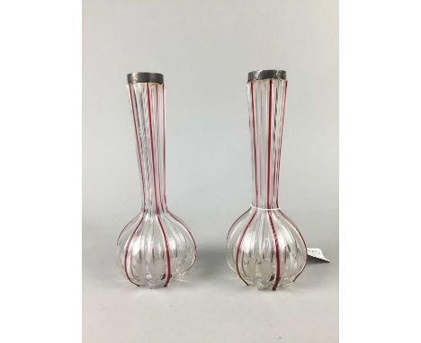 PAIR OF EDWARDIAN BOTTLE VASES,clear glass with ruby flashed channels, bearing silver collars by John Hazelwood Worral, Londo