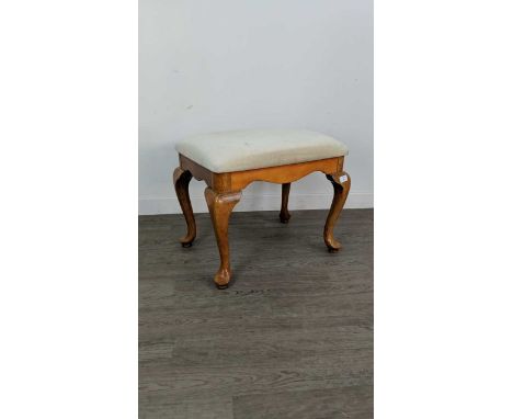 WALNUT DRESSING STOOL,54cm wideCondition report: 53cm wide45cm highminor scratches to the legs, also a rip in the seat. See a