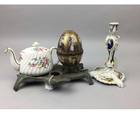 CONTINENTAL PORCELAIN EGG,transfer printed with panels of ladies within gilt borders, along with a KPM candlestick, a Mintons