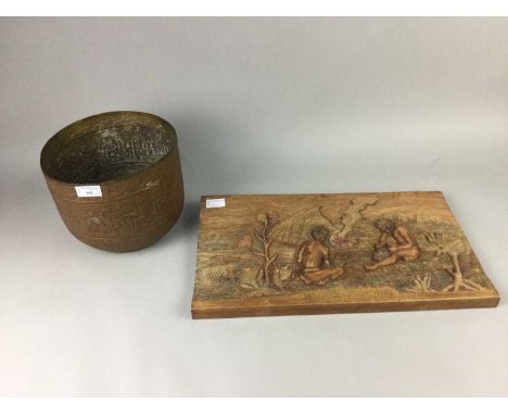 PERSIAN BRASS PLANTER,19.5cm high, along with an Aborigine carved panel (2)