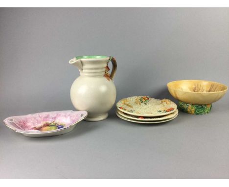 CLARICE CLIFF GLOBULAR JUG,along with a lotus planter, a 'My Gardern' pattern bowl, a leaf moulded dish, a smaller dish, and 