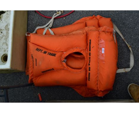 TWO VINTAGE LIFE JACKETS