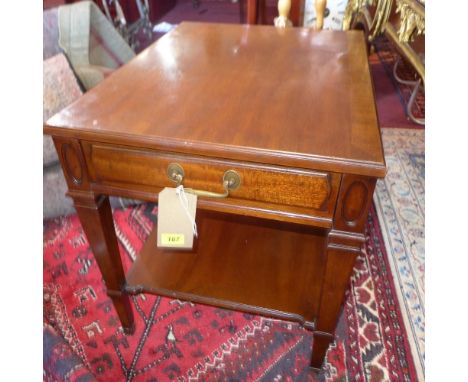 A Georgian style mahogany side table, with a single drawer to one side, raised on square tapering supports with under tier sh
