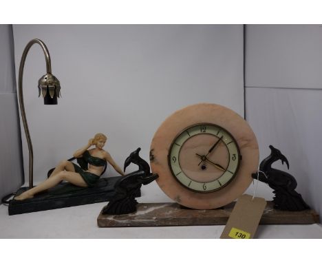An Art Deco marble clock, together with an Art Deco style lamp 