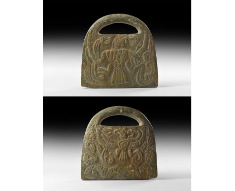 3rd millennium BC. A steatite weight with rectangular body, short strap handle to the top; decorated to both sides with a bir