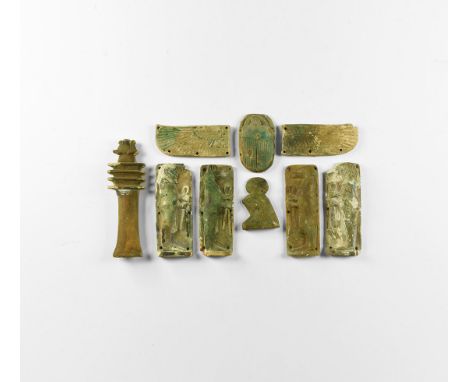 Late Period, 664-332 BC. A group of large glazed composition amulets consisting of: the Four Sons of Horus with mummiform bod