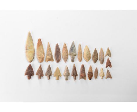 Neolithic, 6th-4th millennium BC. A mixed group of flint and other arrowheads comprising ten leaf-shaped, five barbed, eight 