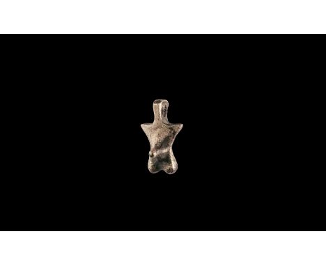 1st-2nd century AD. A silver phallic pendant with suspension ring to the top.   8.81 grams, 26mm (1"). From a private collect