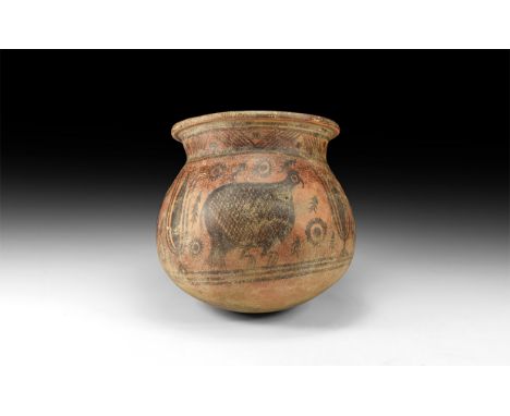 2nd millennium BC. A ceramic vessel with flared rim, globular body and rounded base; neck decorated with a chevron pattern; t