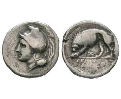 334-300 BC. Obv: head of Athena left wearing crested Phrygian helmet with KE monogram behind. Rev: lion feeding left with KE 