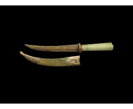 17th-18th century AD. An iron dagger with scabbard; cylindrical jade handle with flower motif to the top set with six rubies;