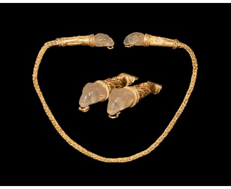 2nd century BC. A gold trichinopoly chain with tapering collar to each end, each with applied filigree floral motifs, braided