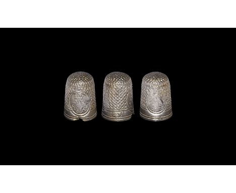 1662 AD. A silver thimble with domed top and slightly tapered sides, the body and top with twelve rows of raised annulets; to