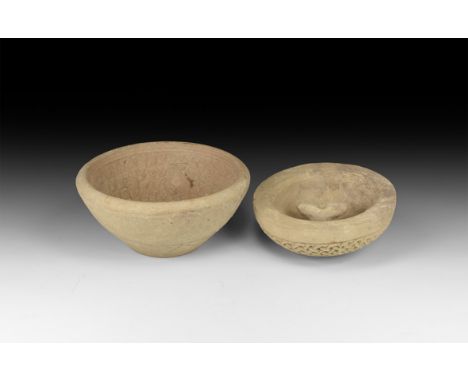 14th century AD. A pair of ceramic moulds for the production of pottery vessels, the inner with concentric interlace bands an