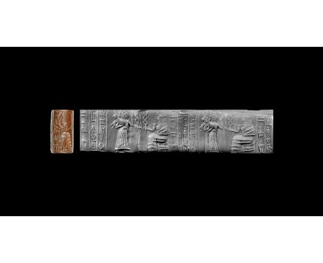 Akkadian, Sargonic Period, late 3rd millennium BC. A haematite cylinder seal of Ur Period III, engraved with a standing worsh