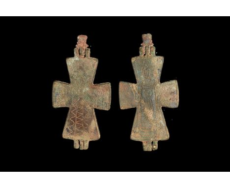 10th century AD. A substantial bronze reliquary cross pendant with low-relief robed nimbate figure of Mary Theotokos and infa