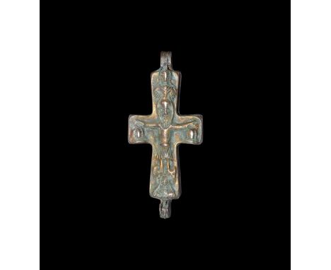 18th-19th century AD. A bronze reliquary cross pendant in Byzantine style with hinge, to each face a high-relief Corpus Chris