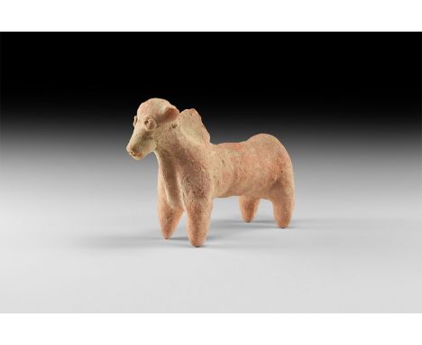 1st millennium BC. A ceramic figure of a zebu with applied eyes and slit mouth; dew lap to throat, hump to back of neck; long