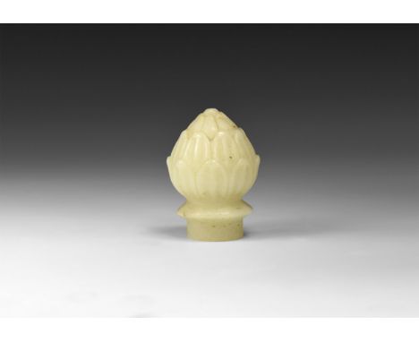 20th century AD. A white marble walking stick top in the form of a lotus flower, flange below.   144 grams, 62mm (2 1/2"). Pr