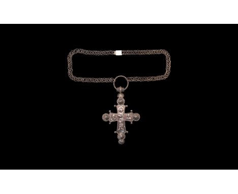 Late 19th century AD. A silver reliquary cross pendant and trichinopoly chain with fastener; cross with barrel-shaped loop an