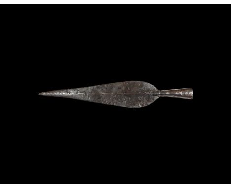 2nd-1st century BC. An iron spearhead with slender heart-shaped blade, thick midrib, flared closed socket. Cf. Stead, I. & Ri