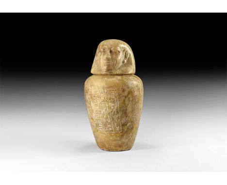 New Kingdom, 19th Dynasty, 1292-1189 BC. A polished alabaster canopic jar with tapering body, separate lid with a human face 