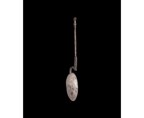 3rd-4th century AD. A silver spoon with shallow ellipsoid bowl, curved square-section neck attached to the underside of the s