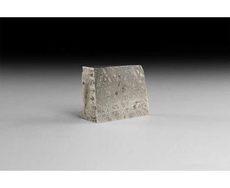 A sawn, polished, and etched section of the Muonionalusta meteorite with well-developed Widmanstatten crystallisation pattern