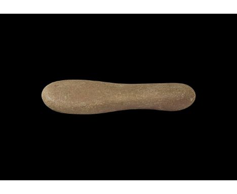 Neolithic, 4th millennium BC. A fine grained sandstone smoother of an irregular oblong shape with rounded ends.   1.1 kg, 24.