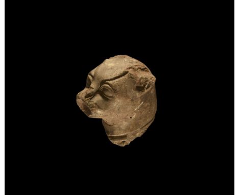 Late Period, 664-332 BC. A ceramic head of a leopard with distinctive eyebrows and small ears; painted decoration to the mout