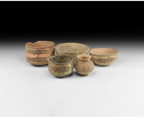 3rd millennium BC. A mixed group of ceramic vessel comprising: a biconvex pot with flared rim frieze of ibexes; cup with fish