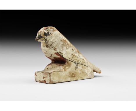 Late Period, 664-332 BC. A wooden painted figure of a seated Sokar hawk from a Ptah-Sokar-Osiris group; facial details highli