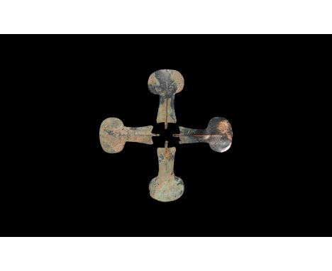 10th-14th century AD. A set of four bronze plates, each a discoid head and flared body with median rib, for attachment to for
