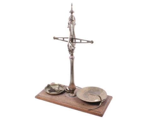 A vintage set of Hunt & Co. brass balance scales. H70cm