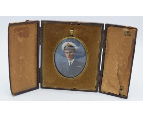 Early to mid 20th century naval officer miniature in leather surround (missing easel back), 10.5cm length of miniature.  