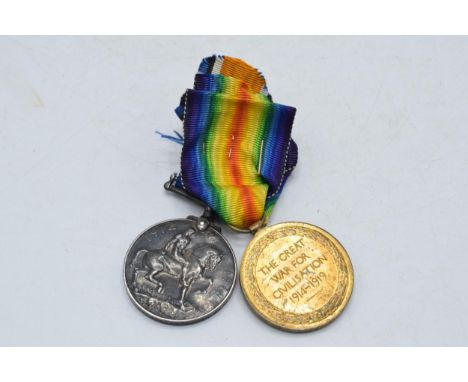 World World One (WW1) pair of medals to include 1914-1918 medal and Great War, Private S E Peoples R Rifle Corp.  