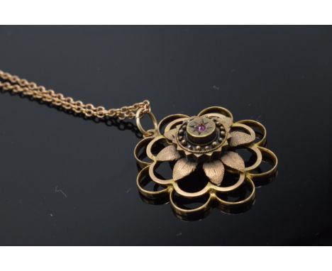 9ct gold chain and 9ct gold pendant set with a ruby, 5.0 grams, 50cm long chain.  
