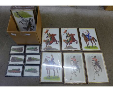 Twenty-two framed, sealed and unused prints of military figures and locomotives 