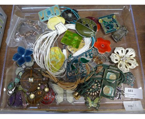 Over thirty enamel costume pendants and necklaces 