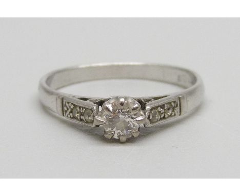 A white metal and diamond set ring, 3g, N 