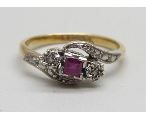 An 18ct gold, platinum set ruby and diamond crossover ring, 3.1g, L 