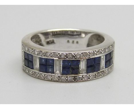 An 18ct white gold, sapphire and diamond ring, marked K18, 7.9g, N 