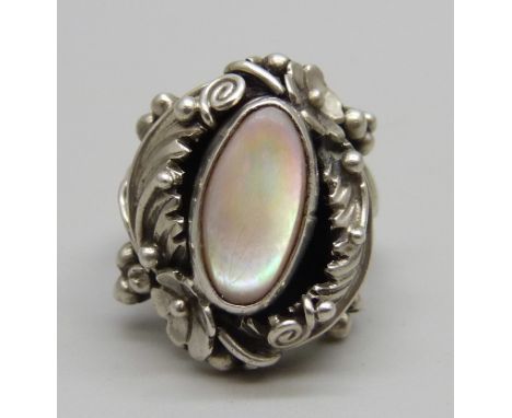 A silver Navaho ring by Tony Guerro, J 