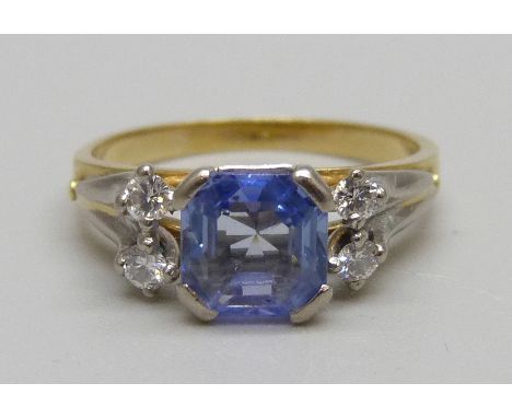 An 18ct gold aquamarine and diamond five stone ring, 3.9g, M 