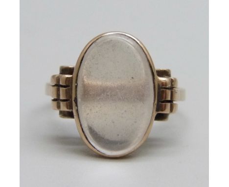 A yellow metal and moonstone ring, marks worn, 3.8g, O 