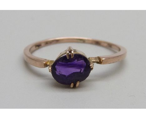 A 9ct gold, amethyst solitaire ring, 1.3g, P 